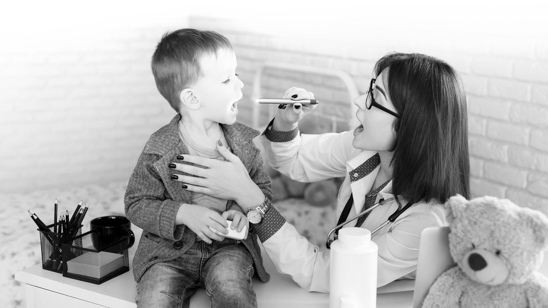 doctor treating child